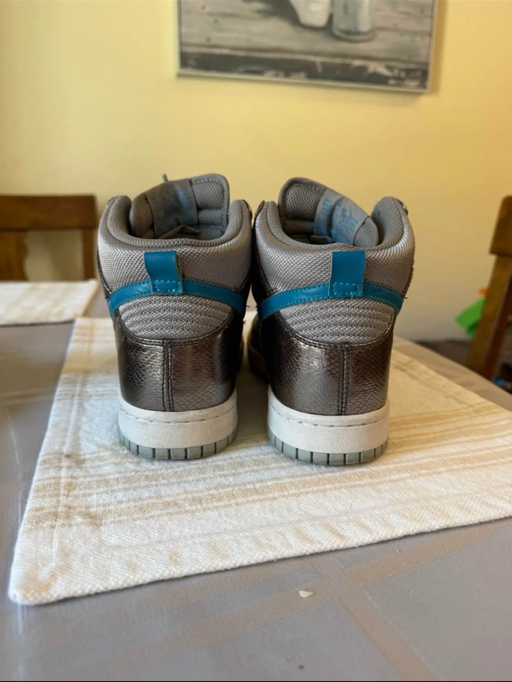 Nike Metallic Gray High-Top Sneakers with Blue Swoosh